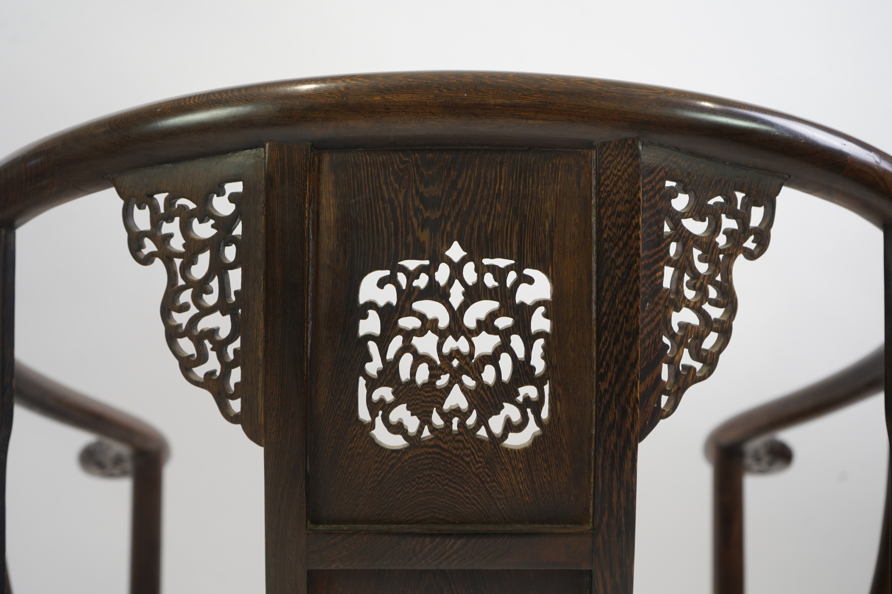 A pair of Chinese jichimu horseshoe shaped armchairs and a matching table, 19th/20th century